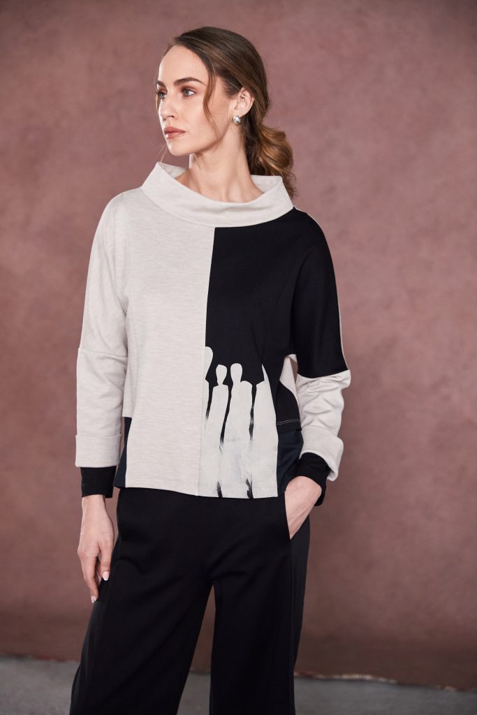 Two tone funnel neck top with placement print at front -Black/Sand